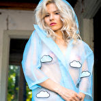 Pic of Zarina A In a Rain Coat