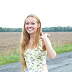 Pic of Virginia Sun strips nude in the middle of a deserted road