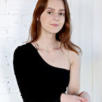 Pic of Amber Plume Redhead in a Black Bodysuit
