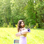 Pic of Naughty Mag - Lola - Big-titted teenager Lola shows off her big cans and ample booty in the great outdoors.