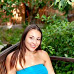 Pic of Sumiko Pulling Down Her Figure-hugging Dress In The Garden - metartdb.com