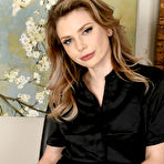 Pic of Beverly Hillson Spreads in a Chair