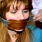 Pic of tied-and-gagged.com | 19 YR OLD NURSE'S AID  GETS BANDANNA GAGGED, HOME MADE LEATHER STRAP GAGGED, BALL-GAGGED AND TIED TO A CHAIR WITH ROPE (d-71-09)