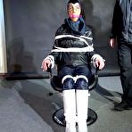 Pic of Shinynylonartsbound | Lady M bound and gagged in Rainwear, white Rubberboots and Latexhood