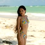 Pic of Kloyali peels off her bikini, revealing perky tiny tits and nipples on the beach