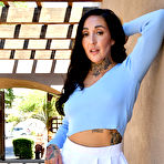 Pic of Summer Wilder lifts her skirt outdoors to toy her pussy